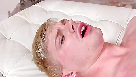 Busty blonde with a nice body and a nice ass is on the bed