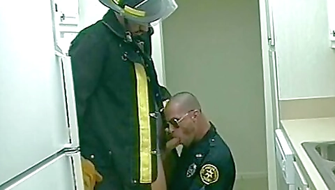 Amateur fireman with a uniform spreads her wide buttocks