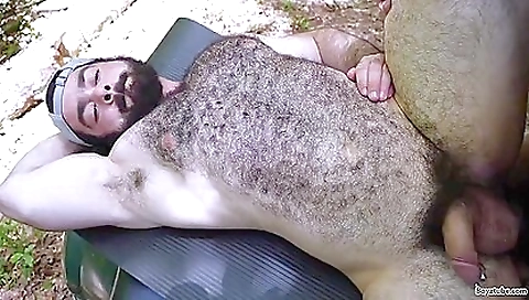 Brunette porn outdoor video with a bear in the woods