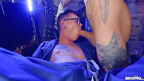 A tattooed man with a big dick enjoys the attention and creampie