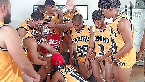 Busty guy with big cock fucks 12 guys in a group sex clip