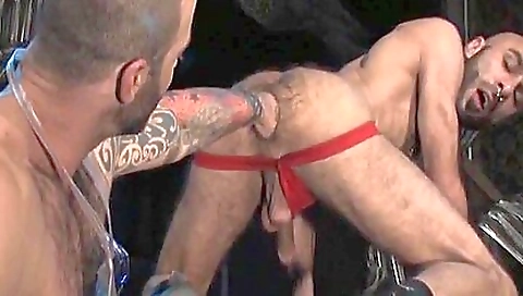 A small dude is getting fucked in the fist pack of the junkyard