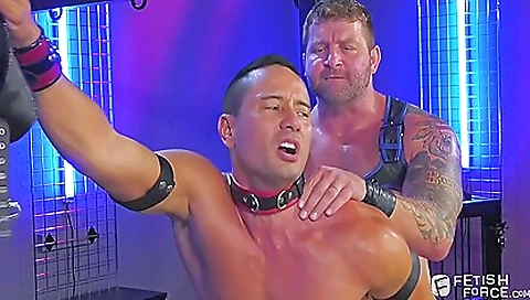 Two horny men are bonding with a big cock and a strapon