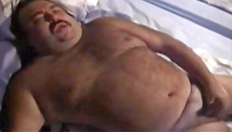 A sexy brunette with nice feet is on the bed to be fucked