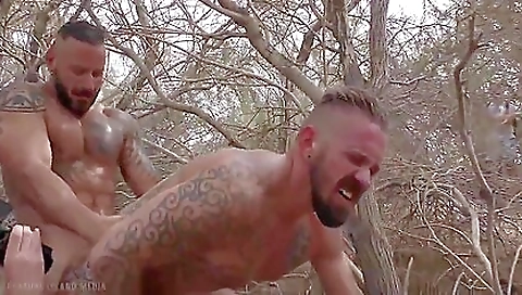 Three guys are going to have a hardcore threesome outdoors